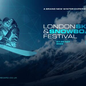 The London Ski & Snowboard Festival returns to Battersea Park in October 2022 Two skiers and snowboarders leap against a mountain backdrop, promoting the London Ski & Snowboard Festival at Evolution London, 27-30 October 2022.