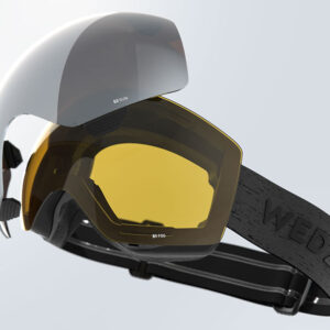 Partnership brings new opportunities to skiers White helmet paired with yellow-lens snow goggles featuring a black strap marked with "WE" branding.